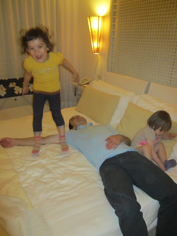 Papa exhausted from the long drive, but little ones refuelled and the bed is our trampoline...