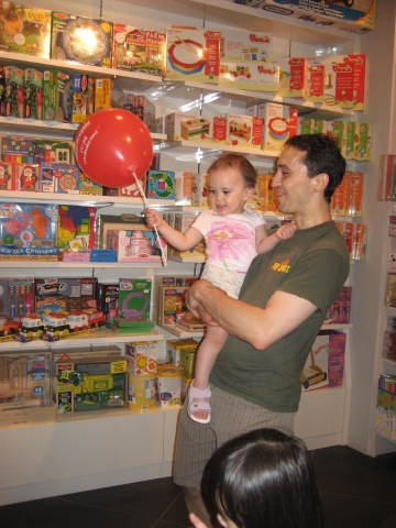 First stop: toy shop! I love my balloon!